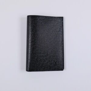Brand new Louis Vuitton Taiga leather passport cover